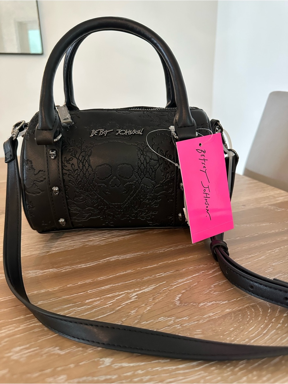 Betsey Johnson Black Embossed Skull Mini Barrel Bag with Pink Tag
